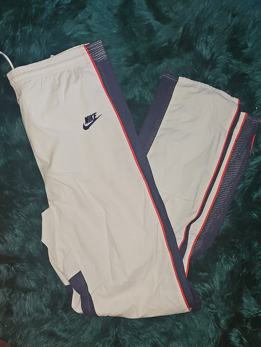 Nike track pants with mesh sides